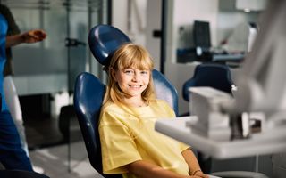 Patient dicsussing dental treatment with a dentist