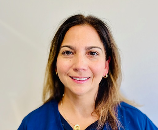 Headshot image of Dr Ana Maria Olano Acosta, your local dentist.