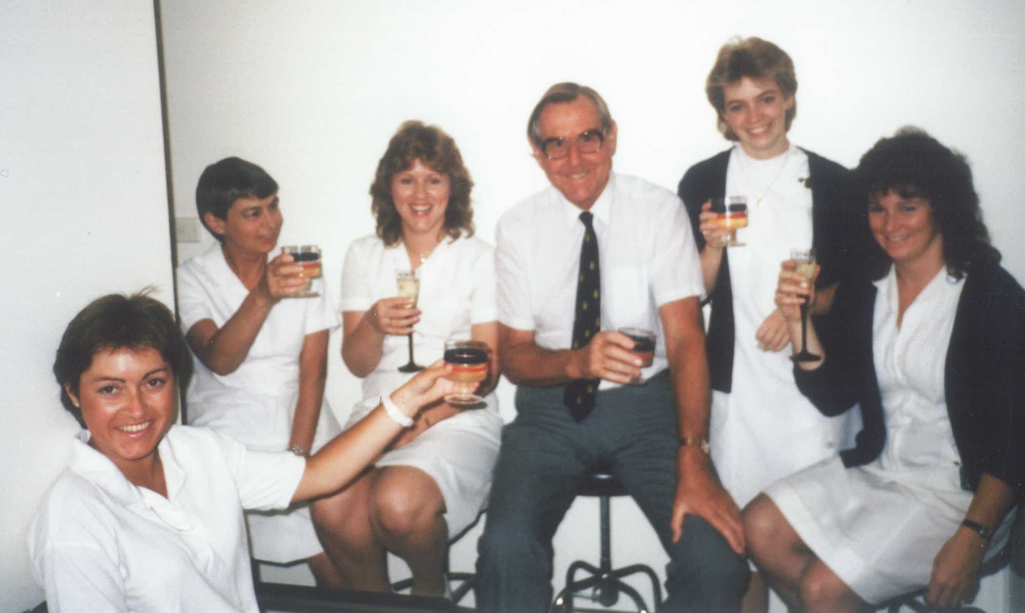 History image of Dr Douglas Hamilton with his dental team in the 1960s.
