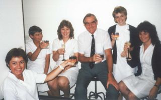 History image of Dr Douglas Hamilton with his dental team in the 1960s.
