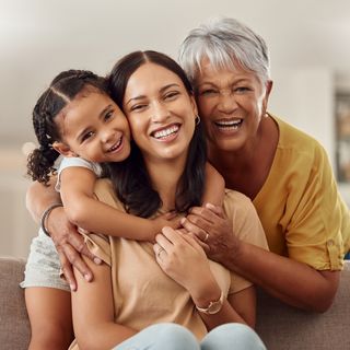 Image of family happy at their home.