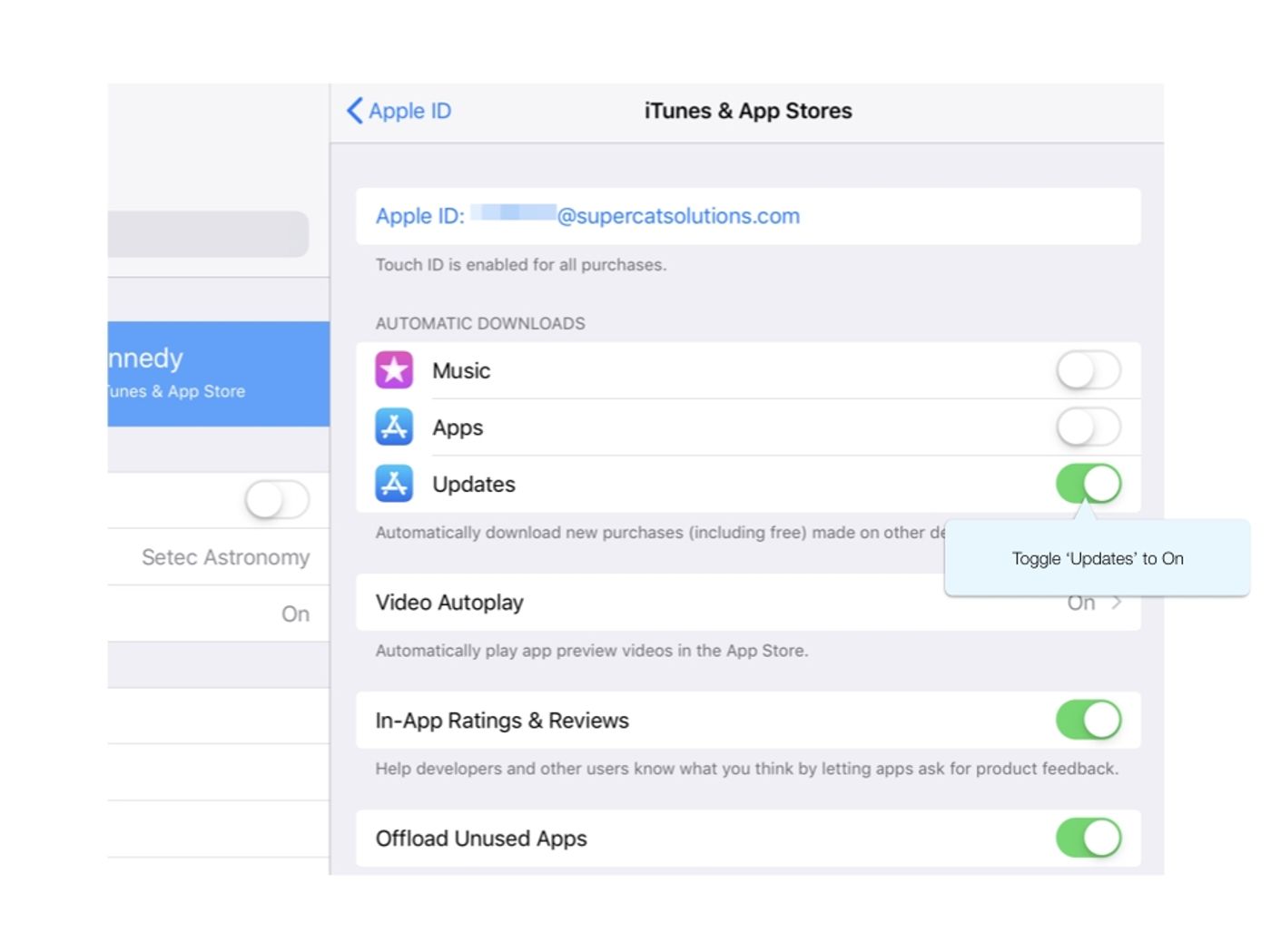 iTunes & App Store settings with the Updates toggle under Automatic Downloads switched on and shown in green.