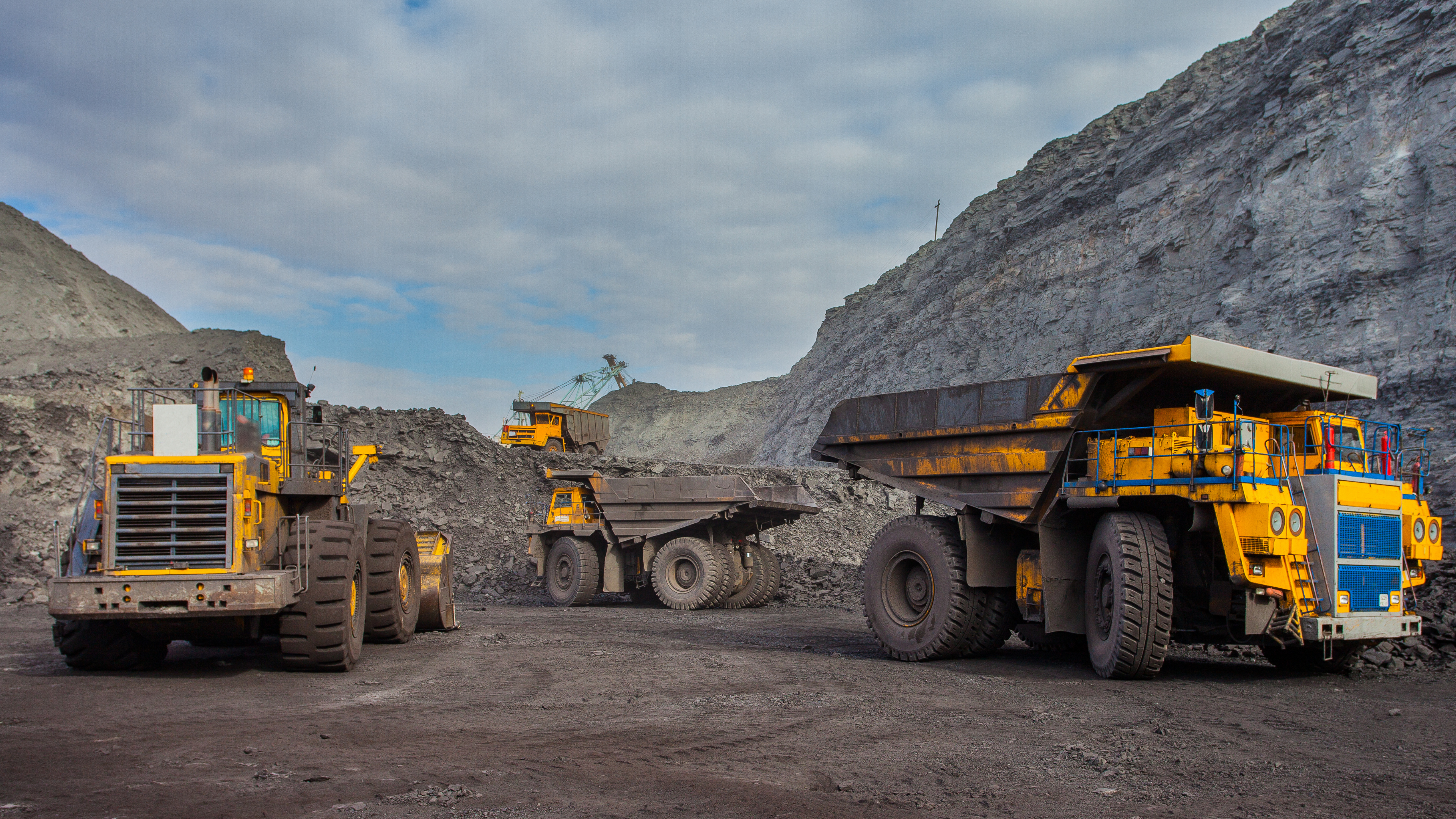 Haul trucks at a mining site