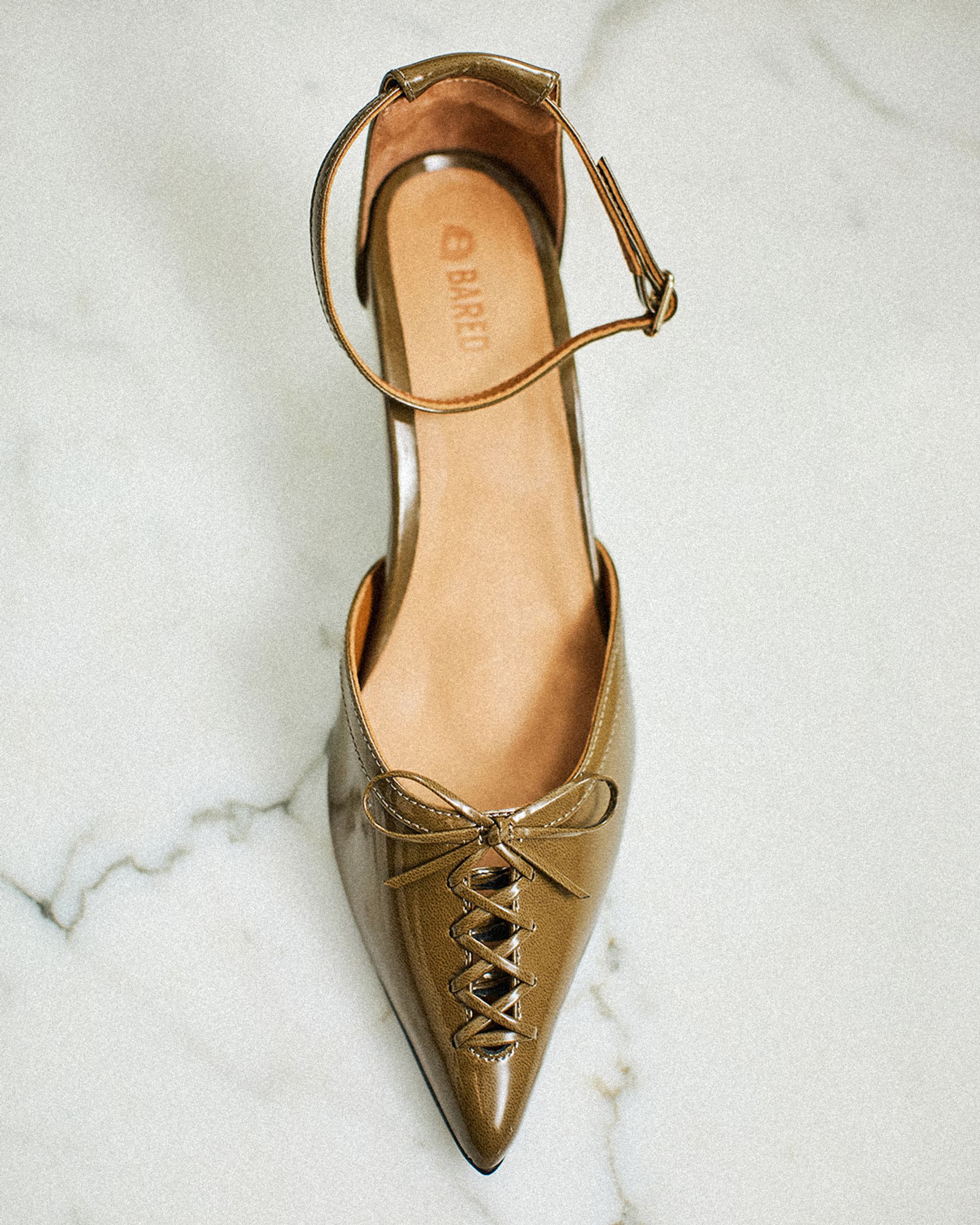 Sharp. Shiny. Suiriri. 🍸 The pointed-toe upgrade your after-dark looks deserve.  #baredfootwear