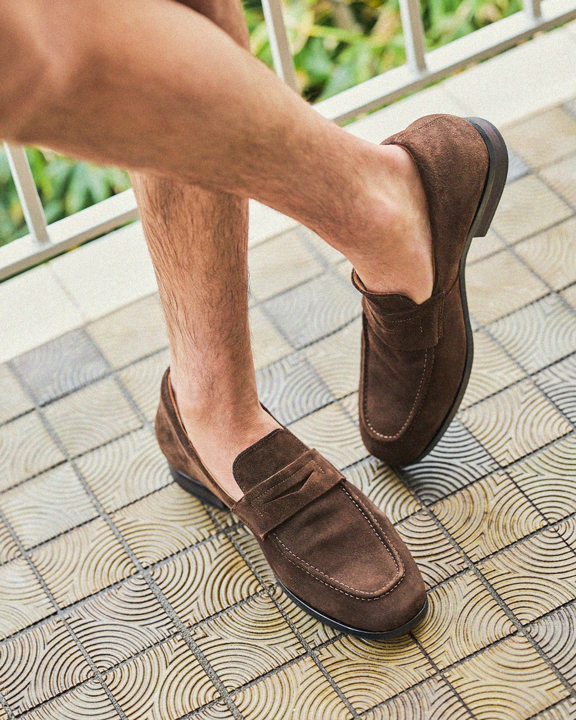 The Samarium loafer delivers a classic penny silhouette, reworked in rich chocolate suede for a luxurious finish.  #baredfootwear