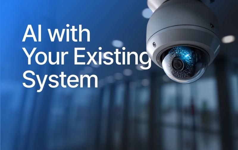Title graphic reading 'AI with Your Existing System', beside a ceiling dome camera in a building lobby.