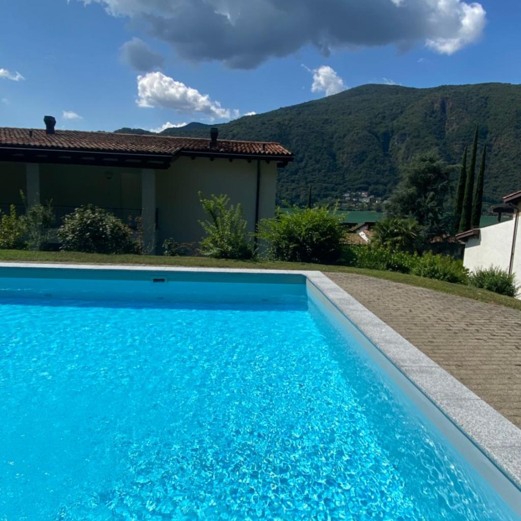 Image 0 - Bellissimo appartamento con giardino sul lago di Lugano