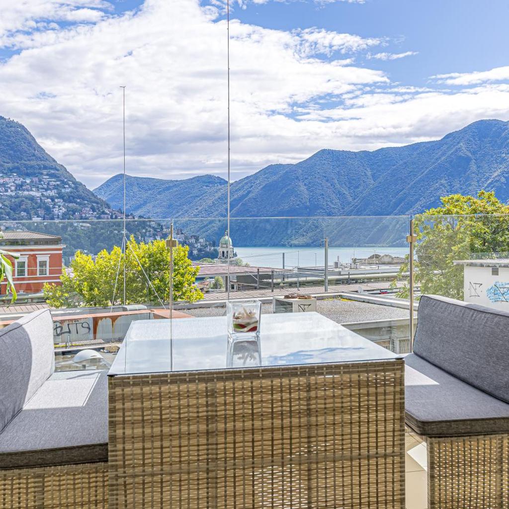 Image 0 - Imperial of Lugano 2 with a lake view and garden behind the station and 10 min from the lake of Lugano