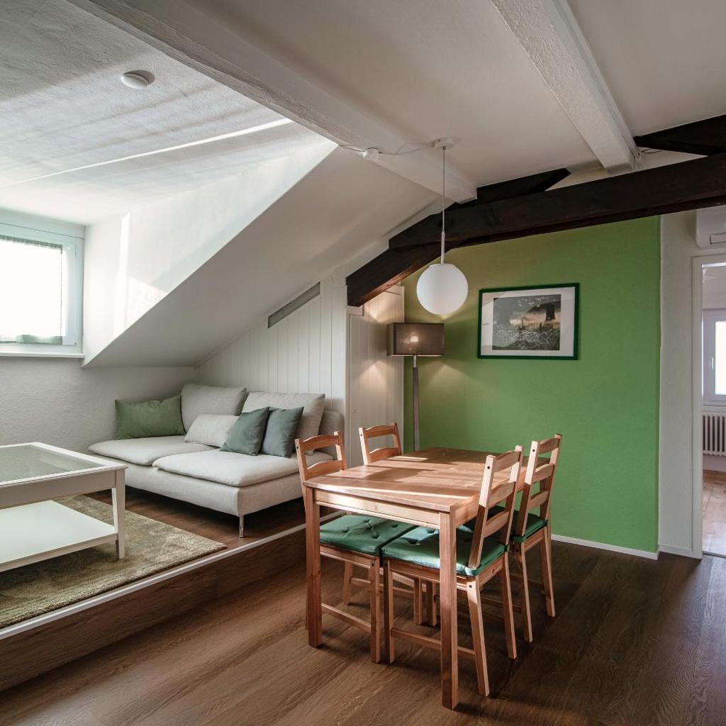 Image 0 - Mansarda Verde by Quokka 360 - Cozy Attic Apartment with Lake View