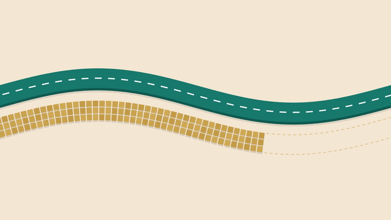 A finished teal highway with white lane markings curving across a pale sand background, with a parallel lane of ochre paving tiles running beside it that stops partway, its remaining course traced only as a dashed outline.