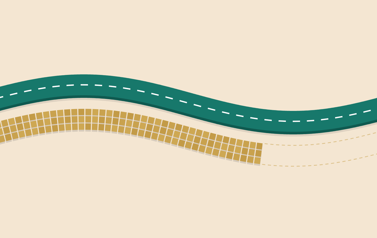 A finished teal highway with white lane markings curving across a pale sand background, with a parallel lane of ochre paving tiles running beside it that stops partway, its remaining course traced only as a dashed outline.