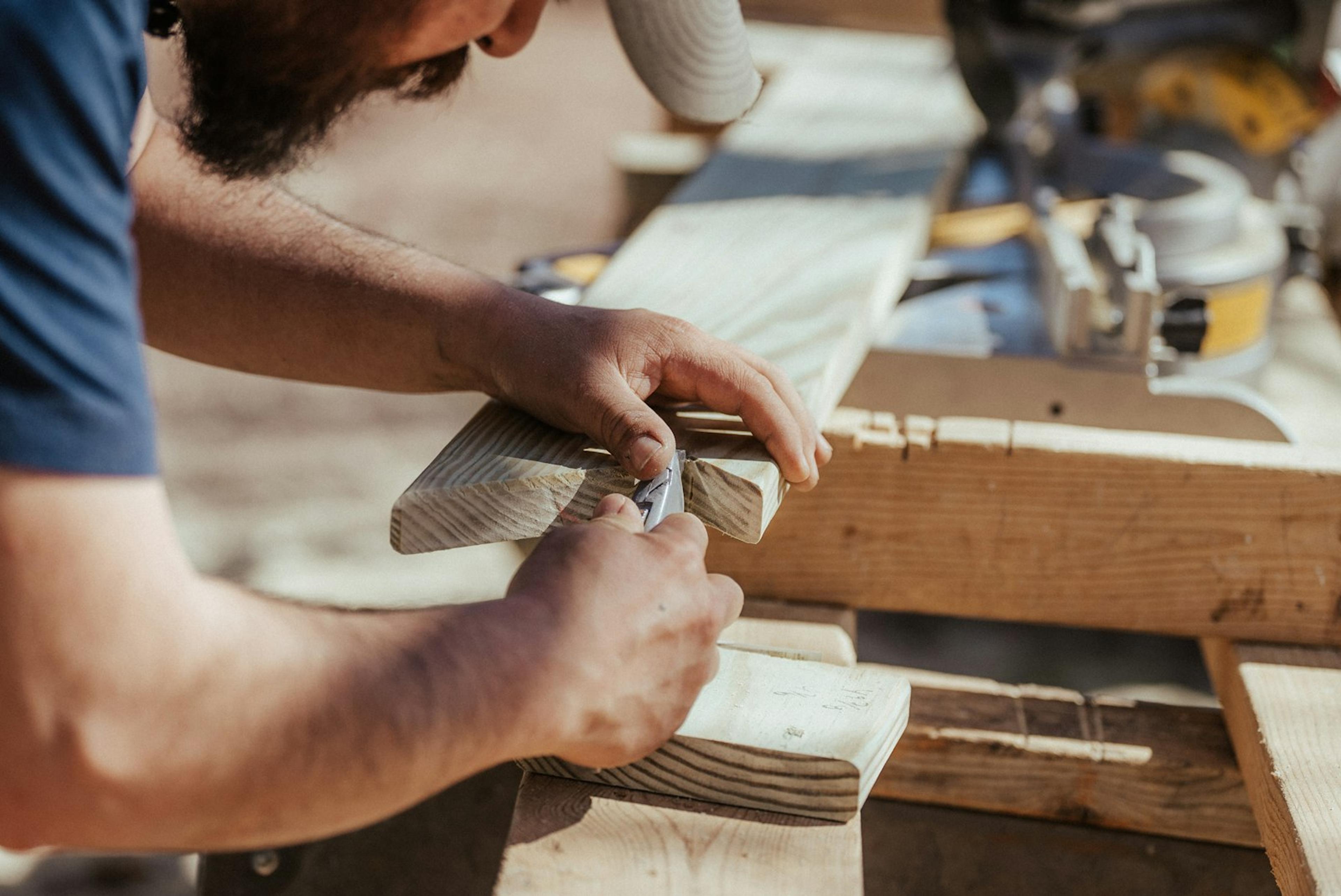 Carpenter shaping a joint