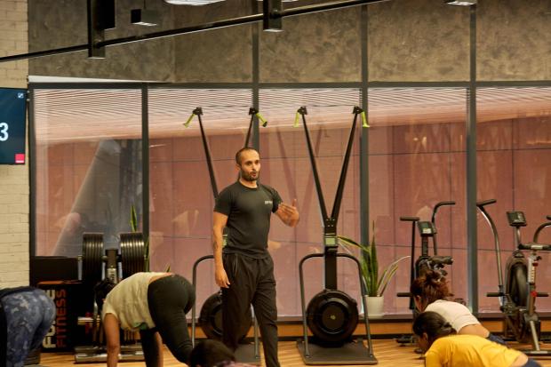 Powered by KV, picture of Krishna Vikas flexing