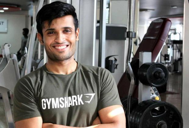 Powered by KV, picture of Krishna Vikas flexing