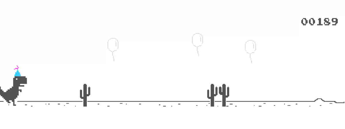 The Chrome Dino birthday party mode -- the T-Rex wearing a blue party hat with balloons floating across the sky