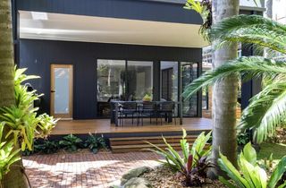 backyard deck with dining table