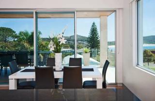coastal dining room attached to alfresco area