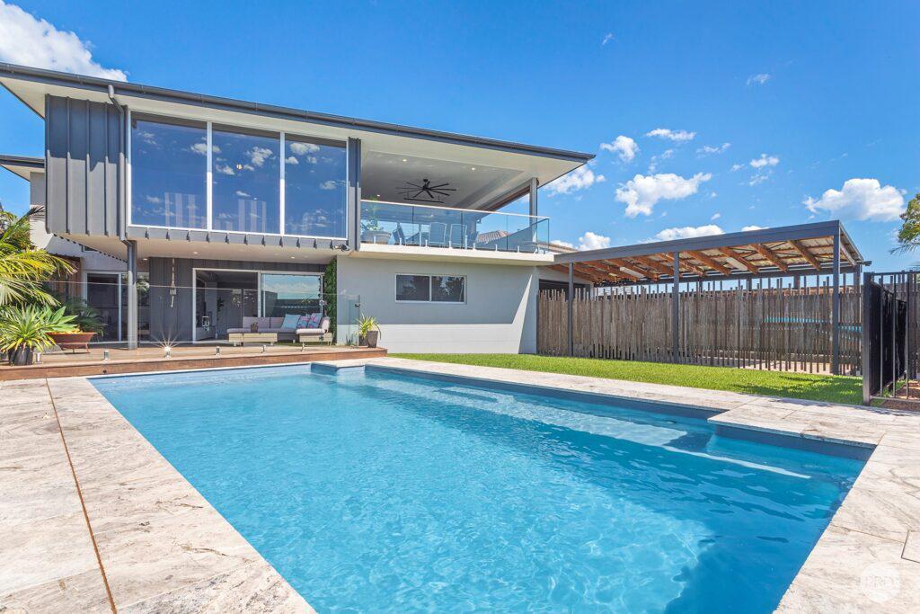 large backyard with swimming pool