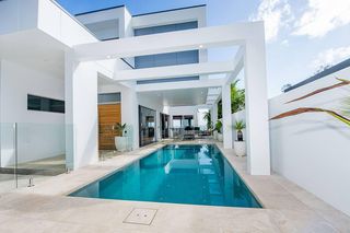 swimming pool in alfresco area of architecturally designed home