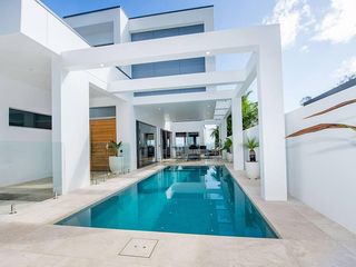 swimming pool in alfresco area of architecturally designed home