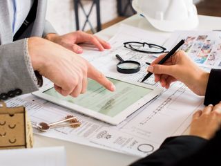 building designers reviewing plans