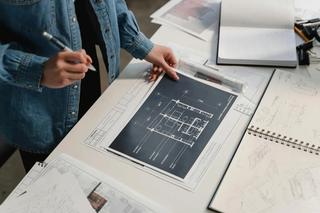reviewing printed floor plans