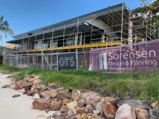 construction site with sorensen design & planning branding