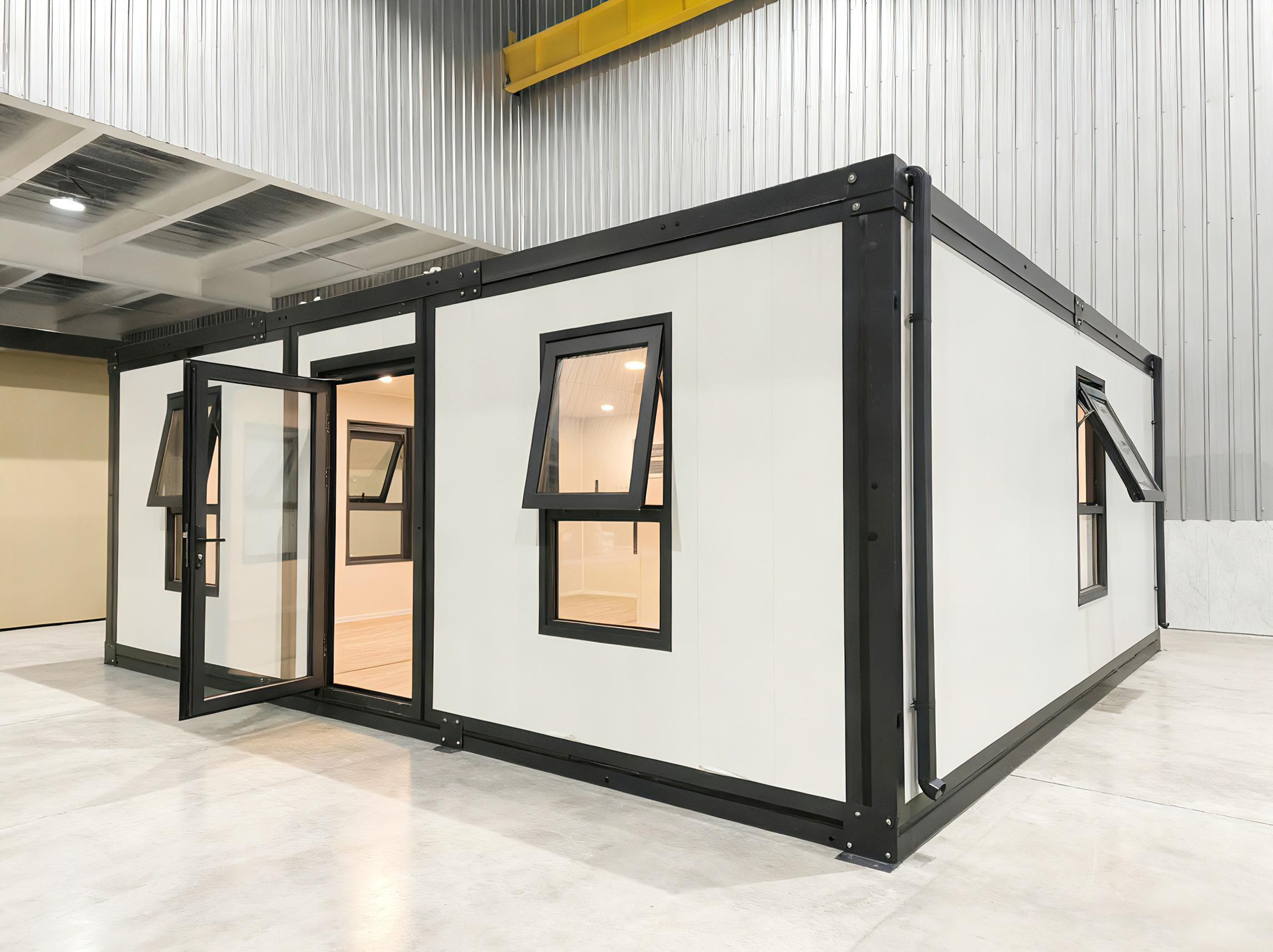 The PrefabX Hub seen from outside, a single storey open plan unit with wide glazed doors