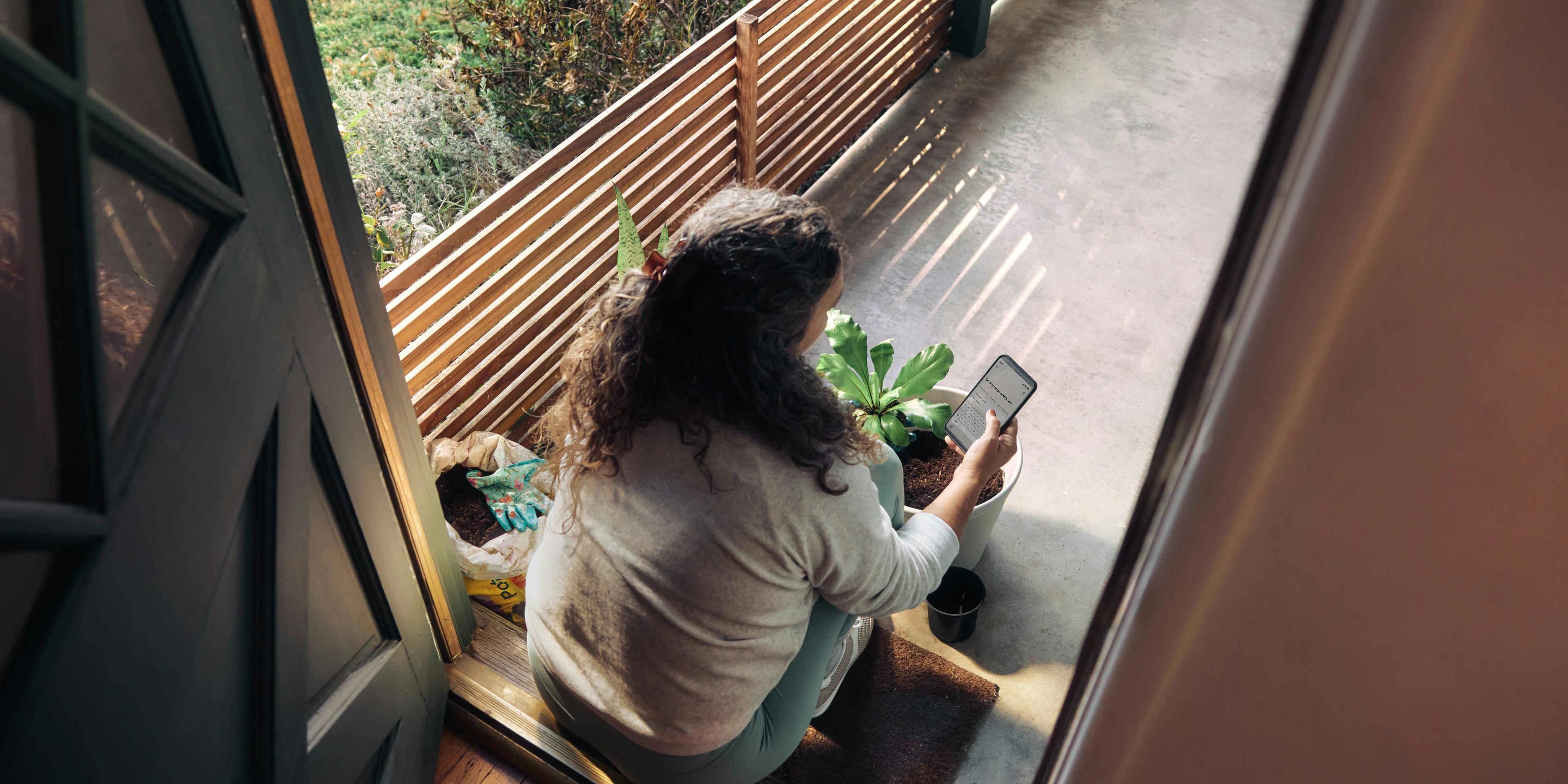 A person sitting on a porch