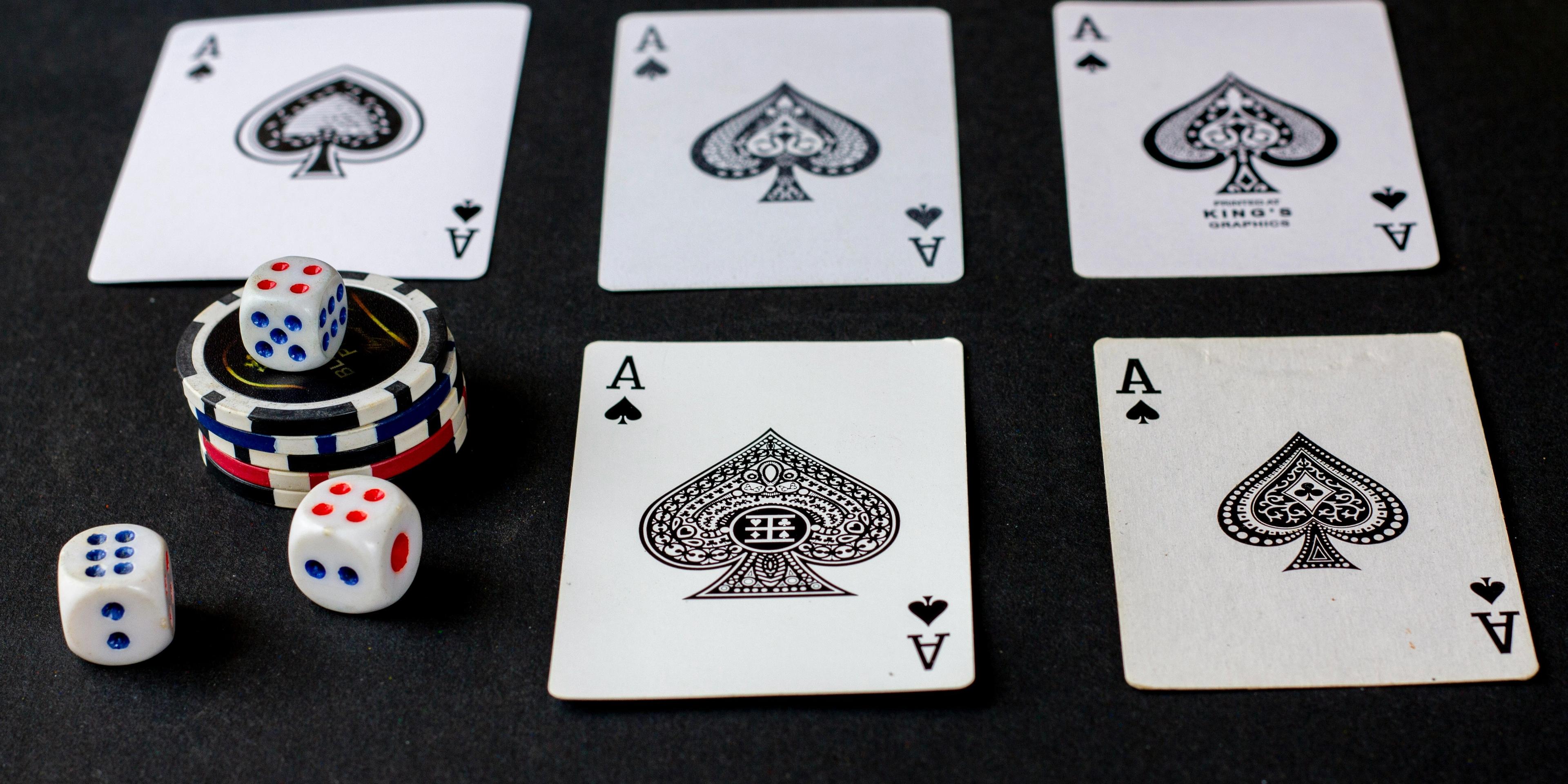 A deck of cards and three die