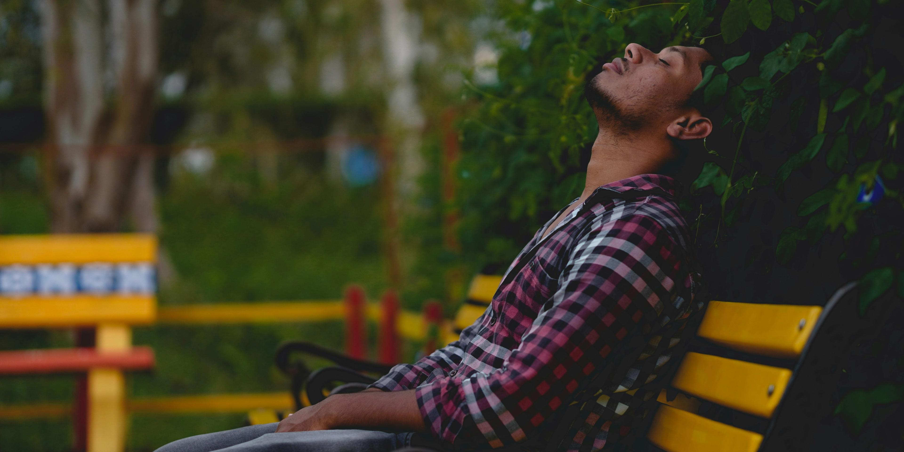 A person sitting on a bench
