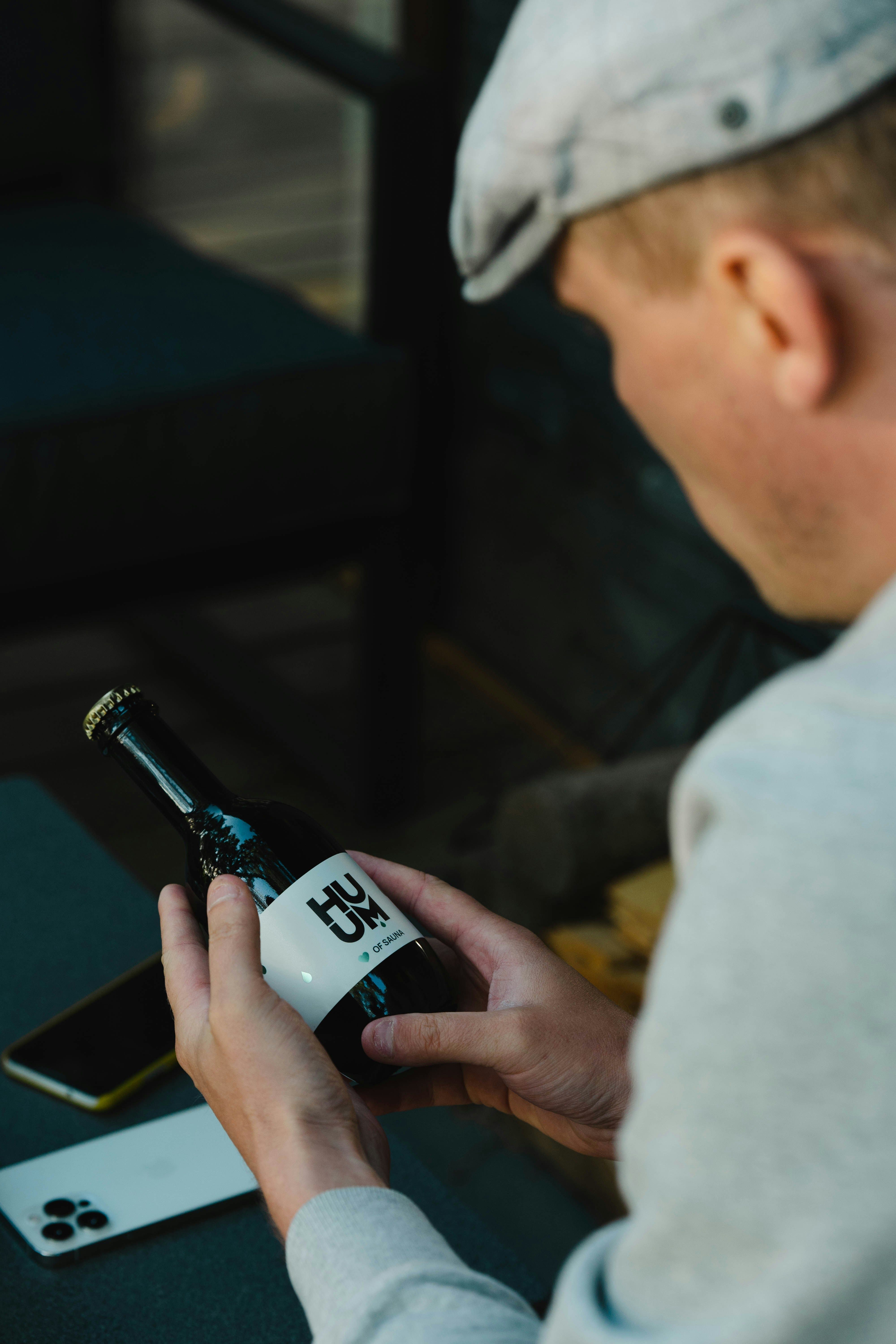 A person reading a bottle