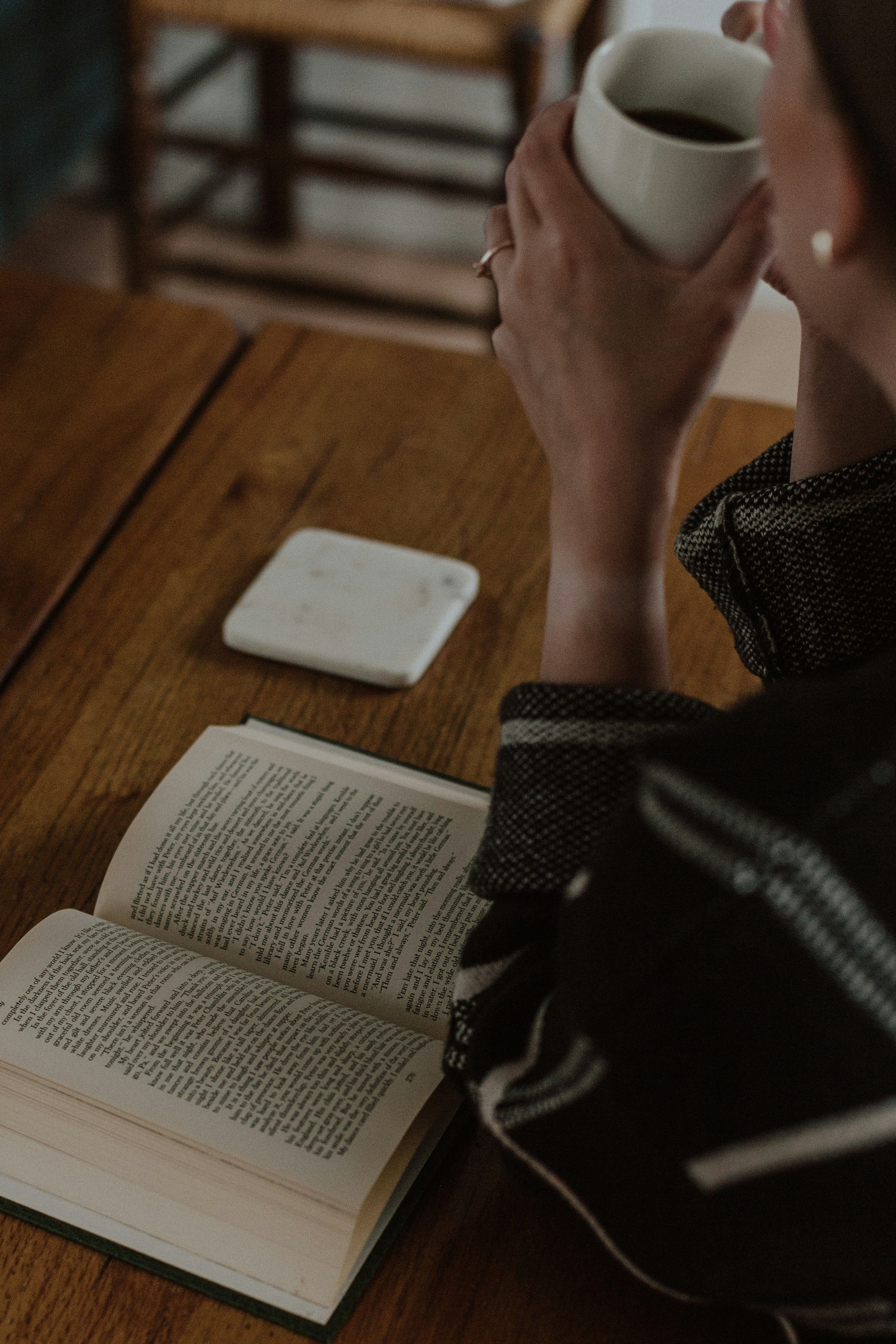 A person drinking coffee
