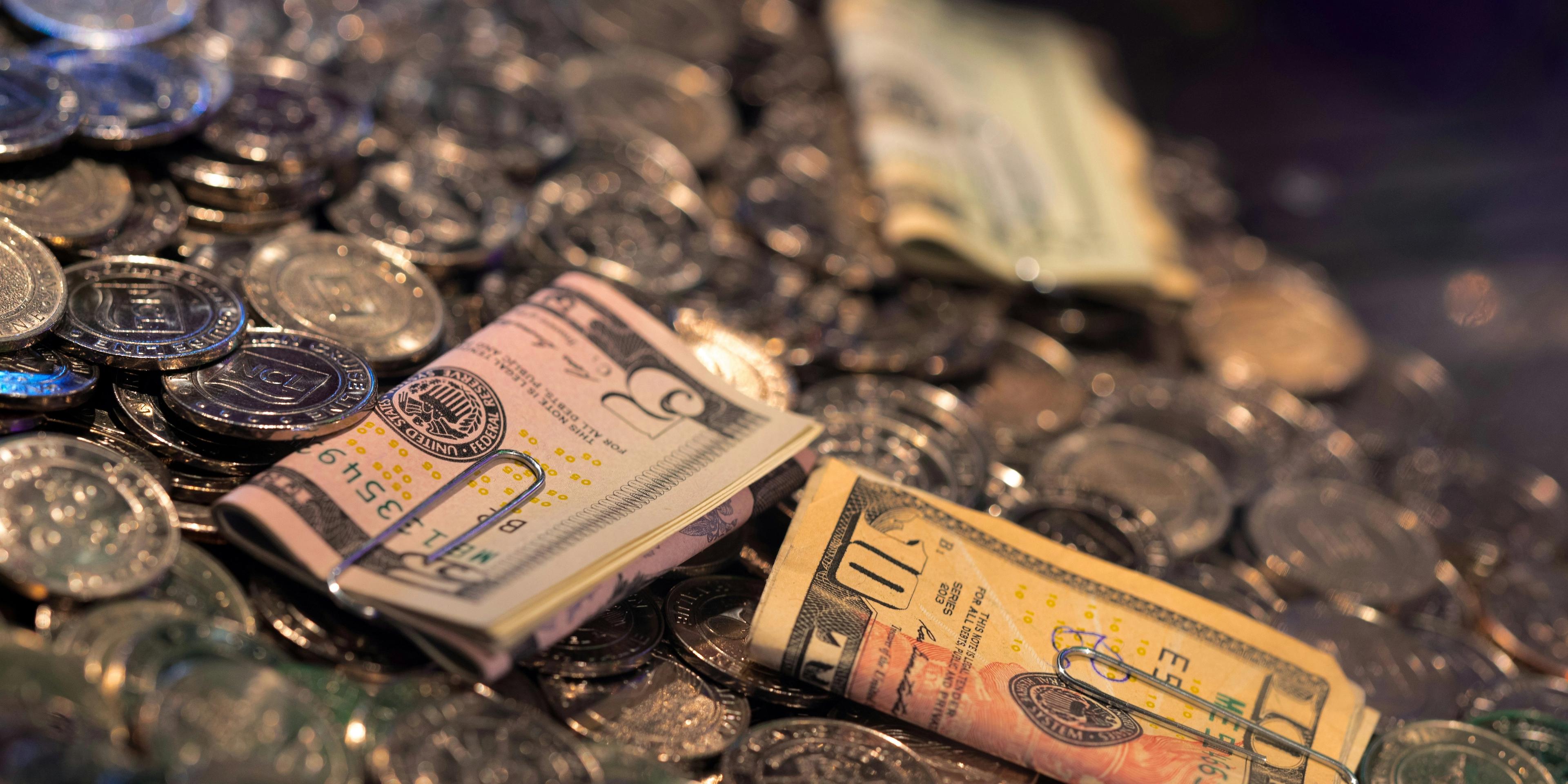 A bunch of money and coins