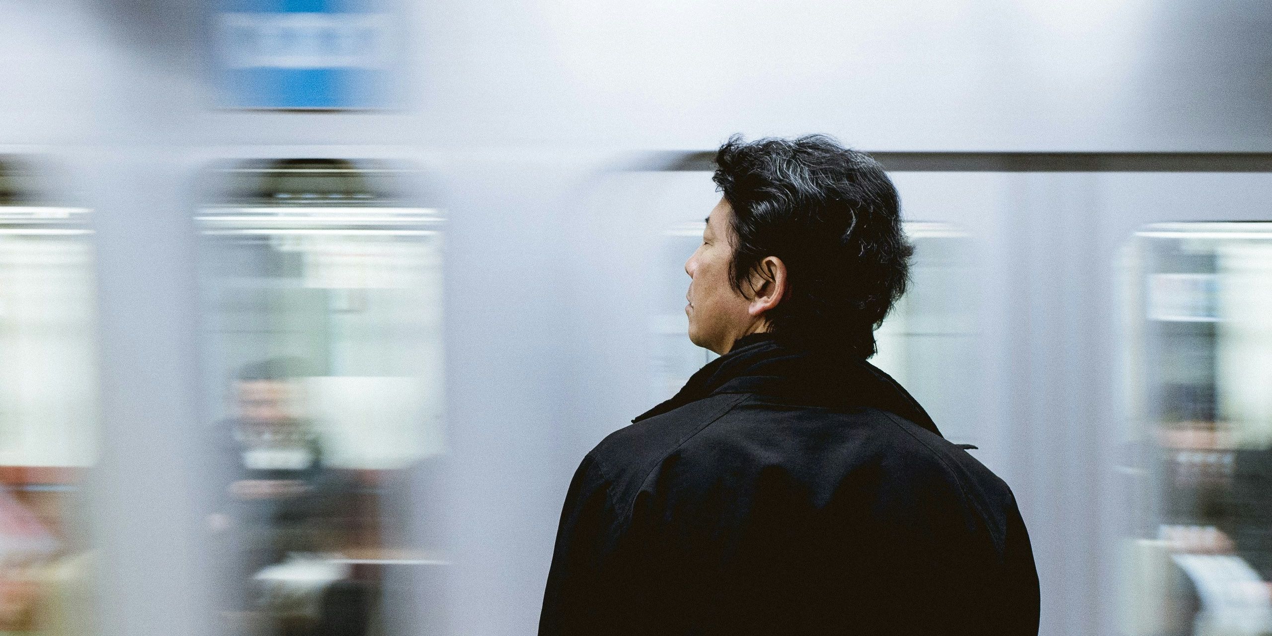 A person waiting on a train