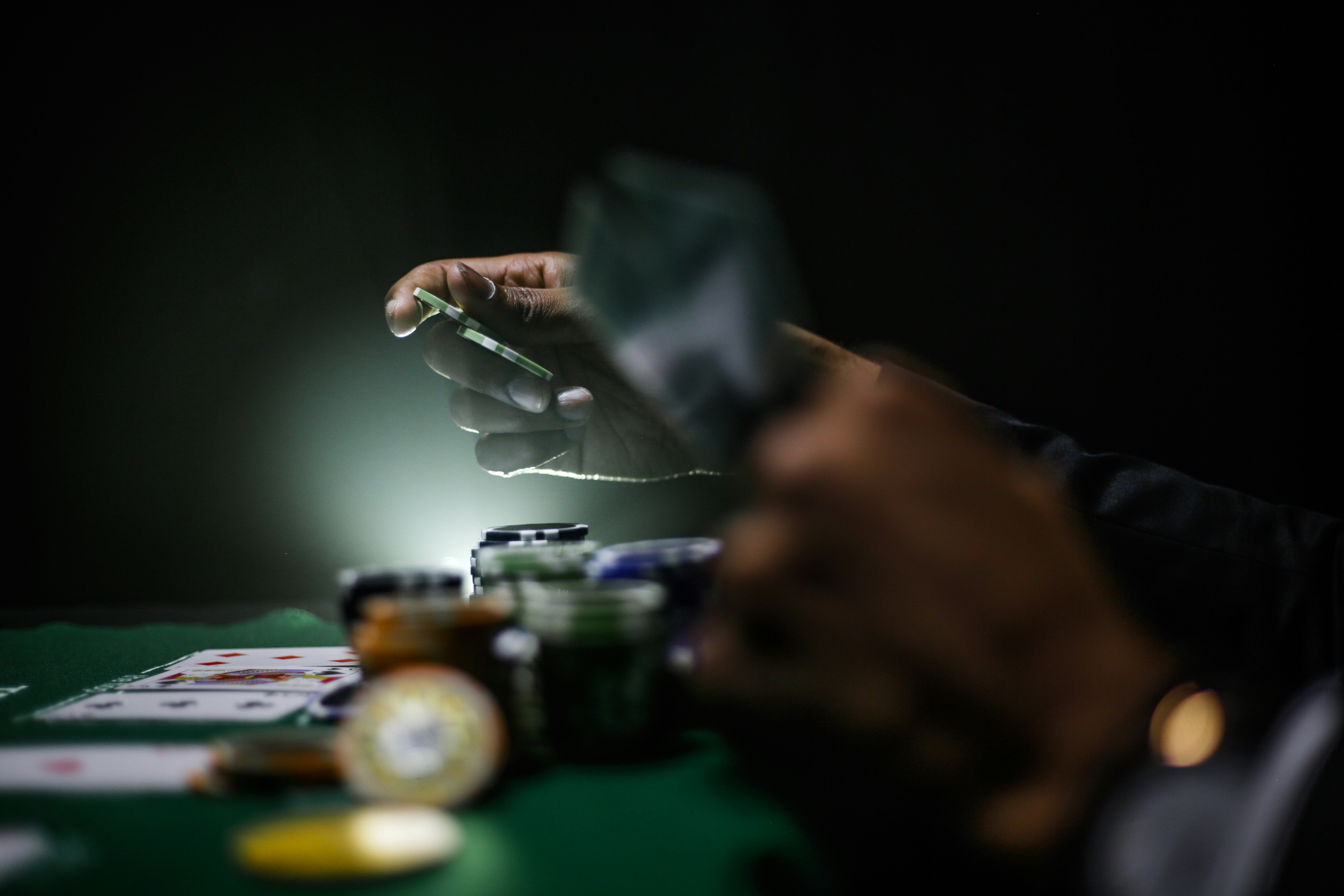 A person gambling on a table