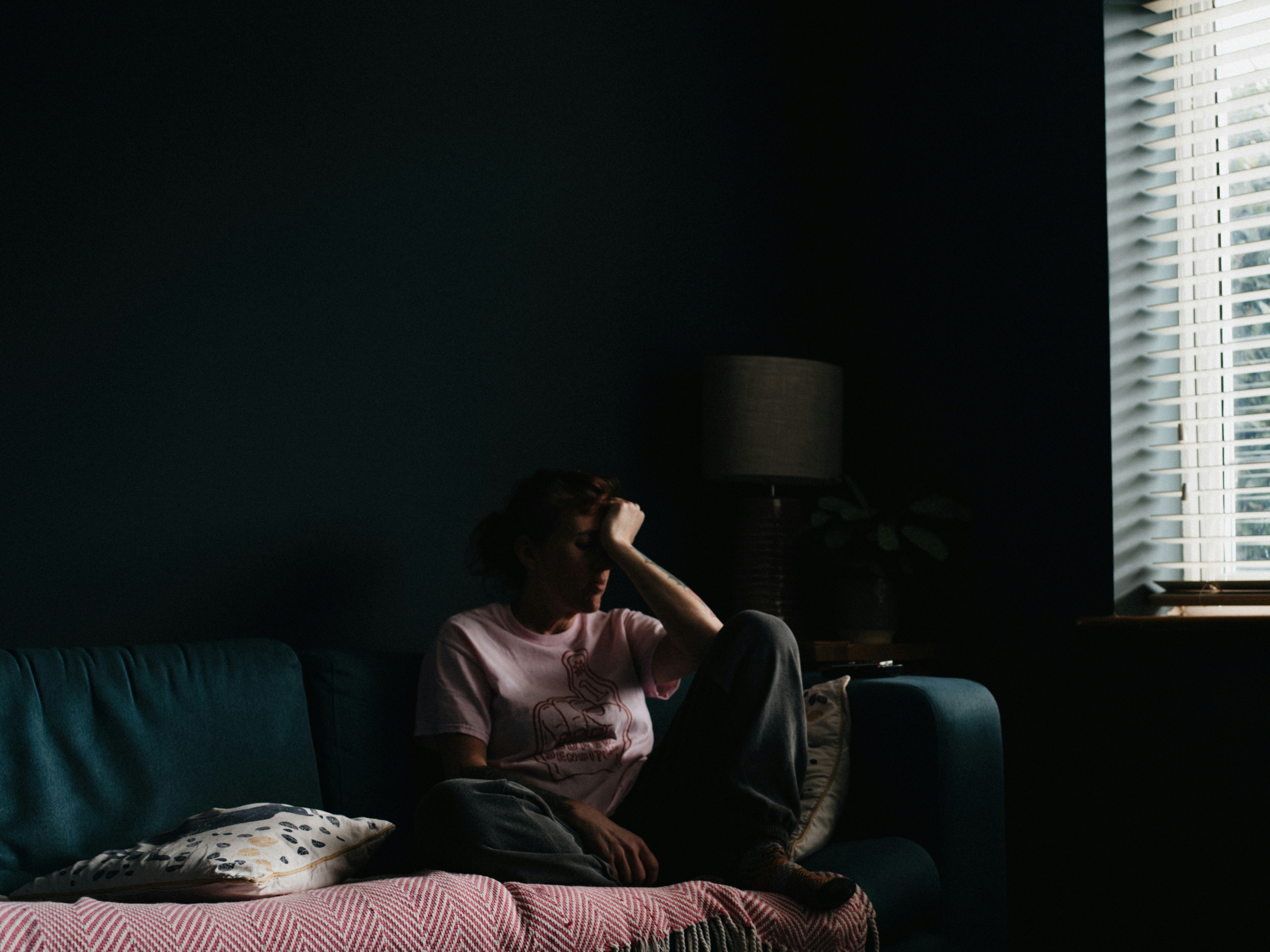 A person sitting on a sofa