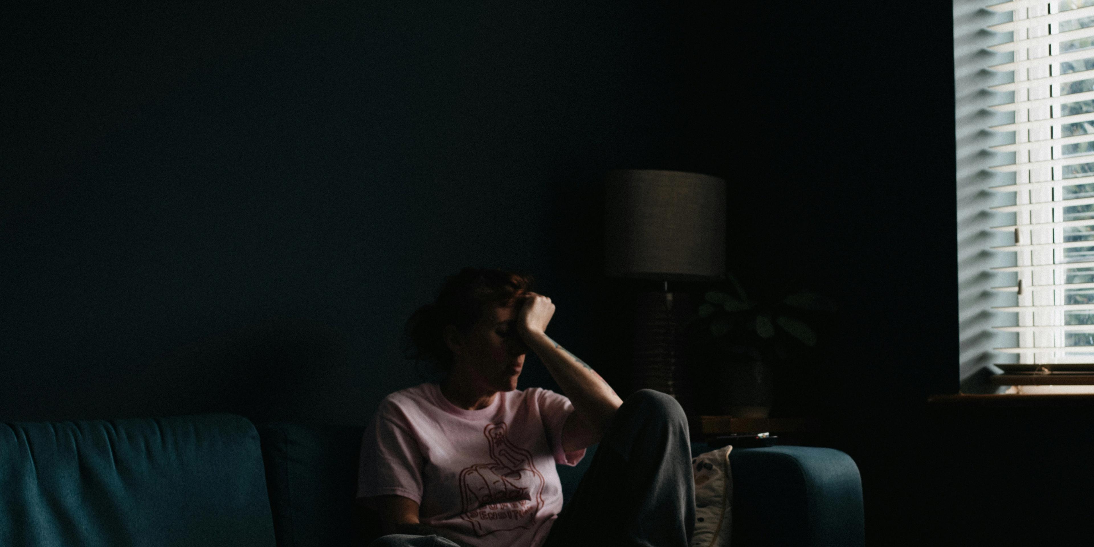 A person sitting on a sofa