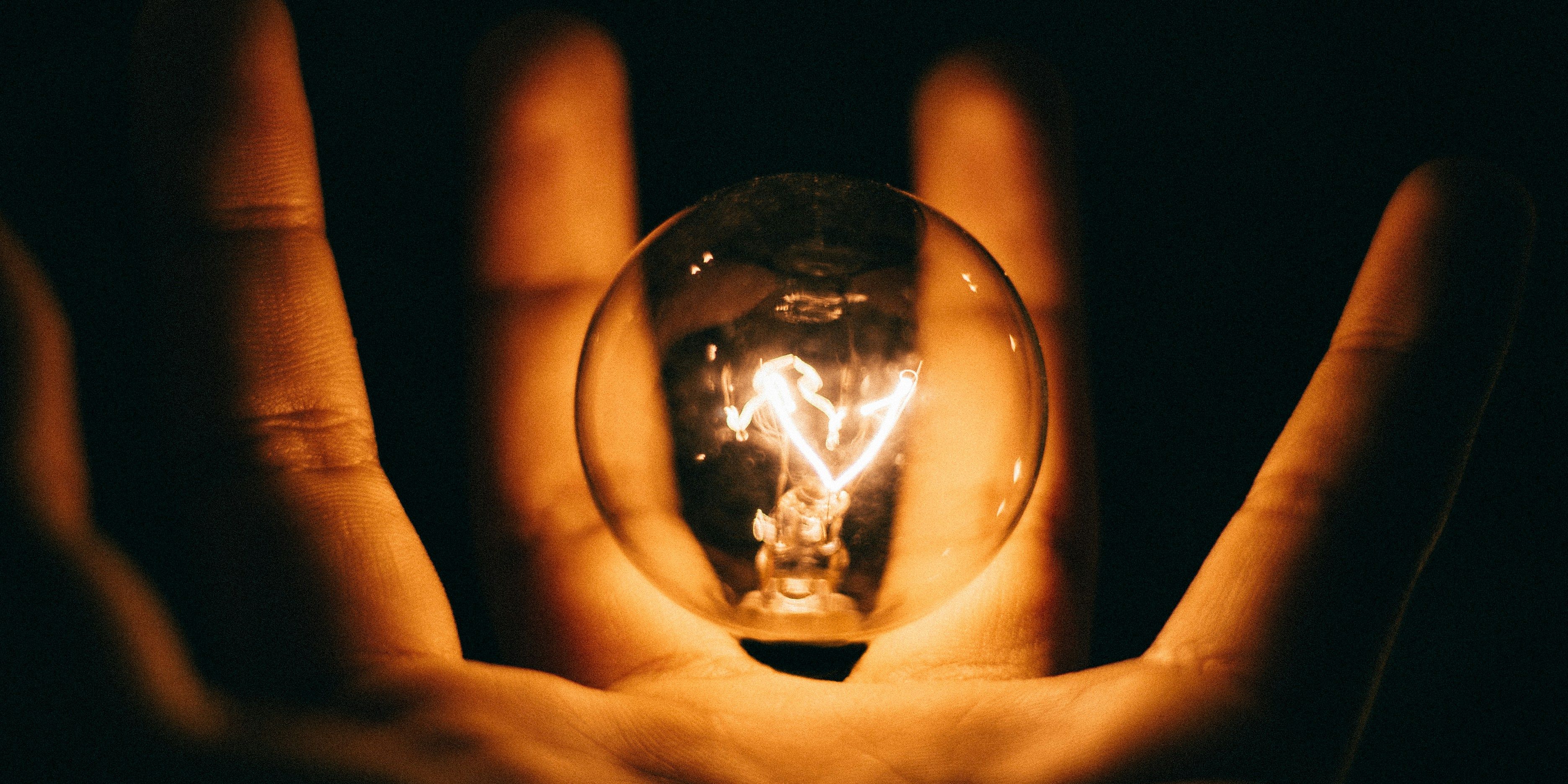 A person holding a glass