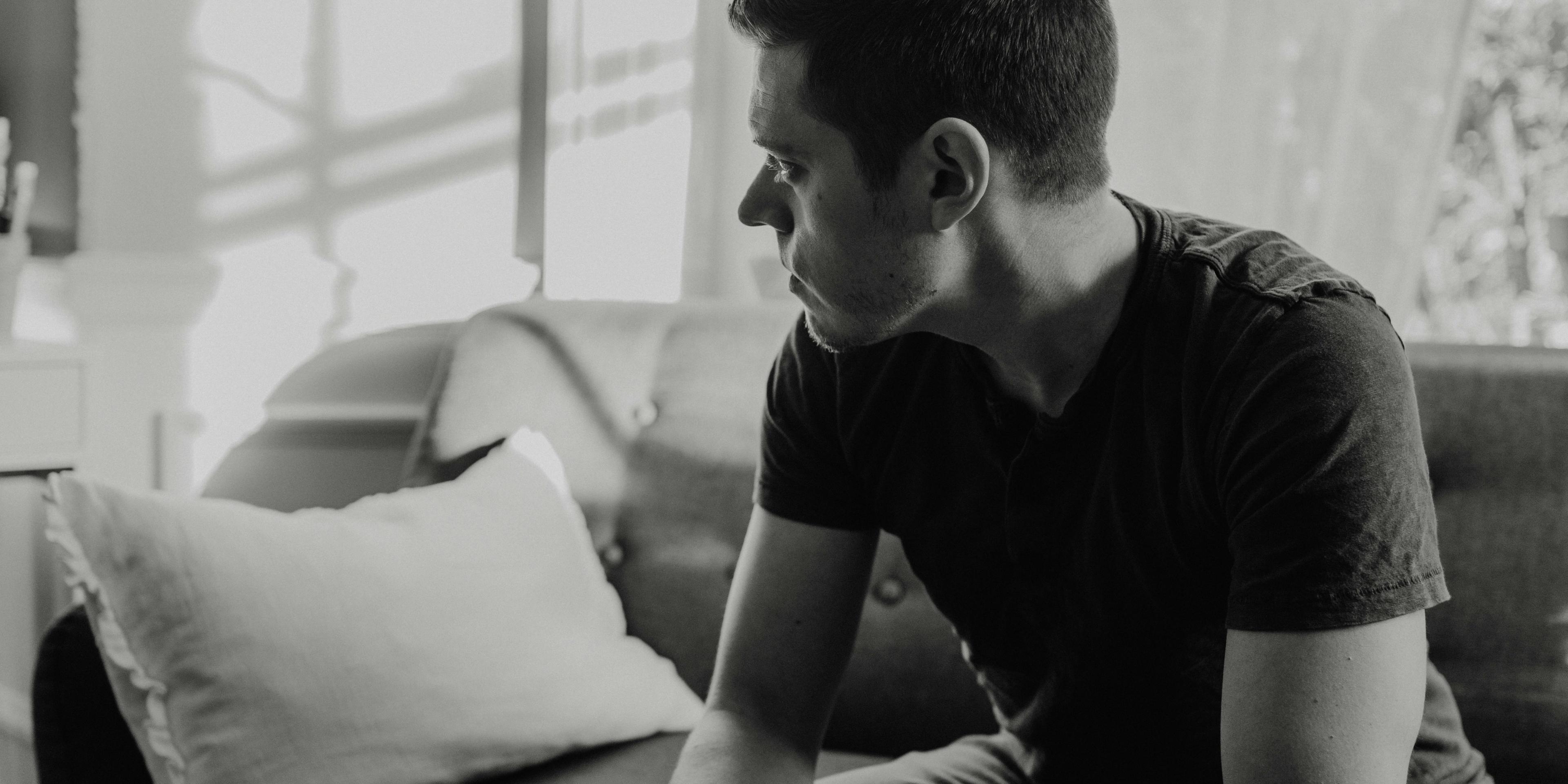 A black and white photo of a man