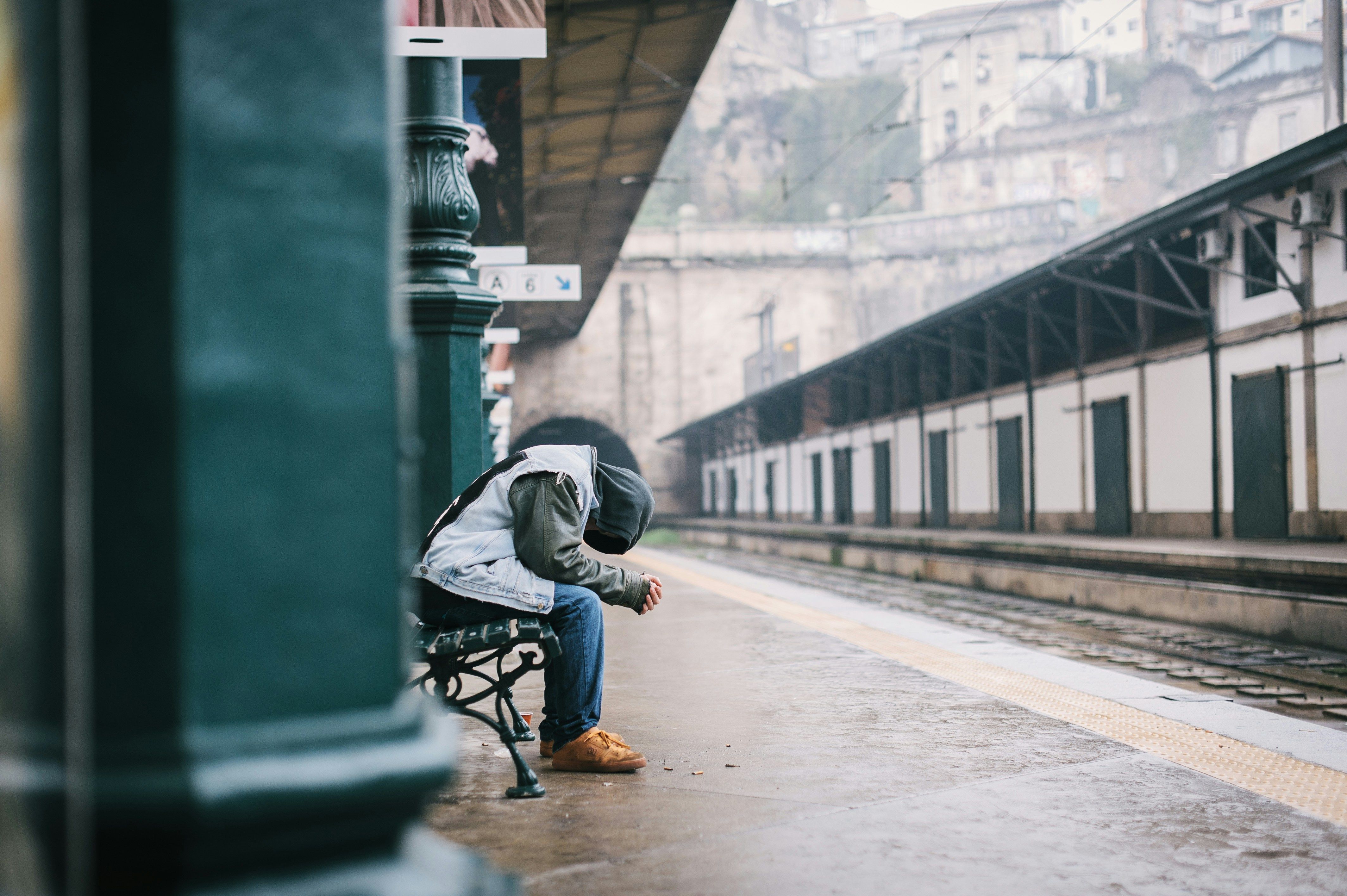 A person sitting on a bench