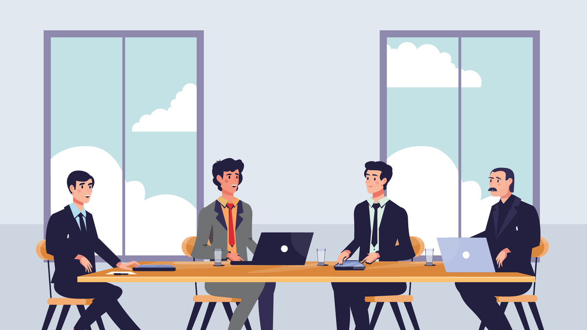 Marketing agency employees strategizing in a meeting around a table.