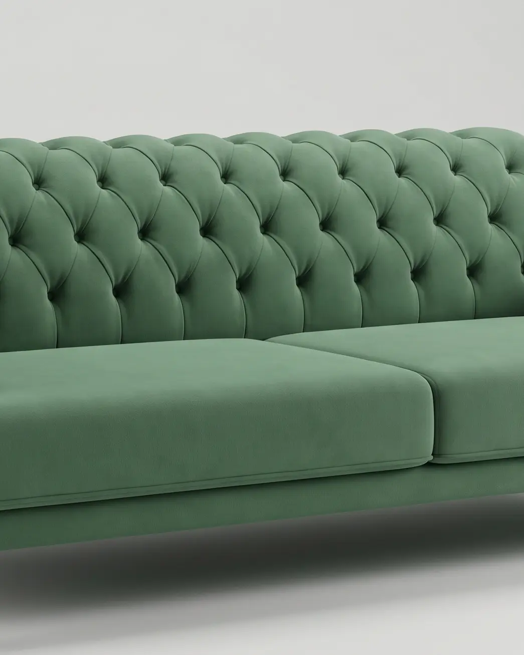 Brusson sofa, mreža prošiva sa dugmetom u svakom čvoru, a ispod nje ravan jastuk sedišta sa paspulom po obodu