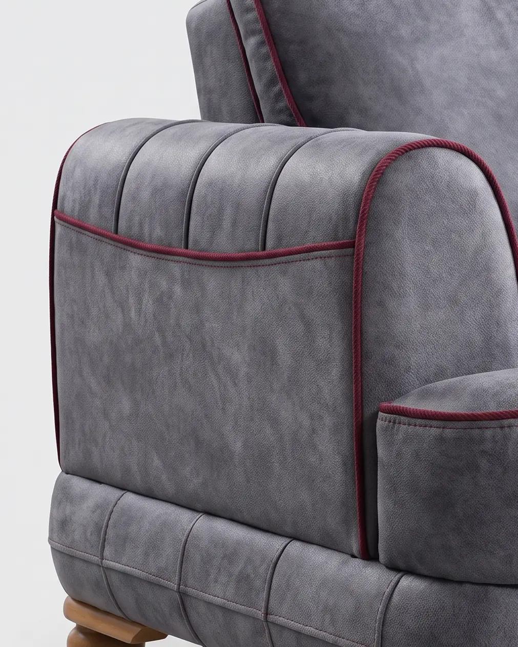 Vernole sofa, rukonaslon: paspul ide uz prednje čelo, preko vrha i niz ivicu boka; sredina boka je ravna, bez paspula