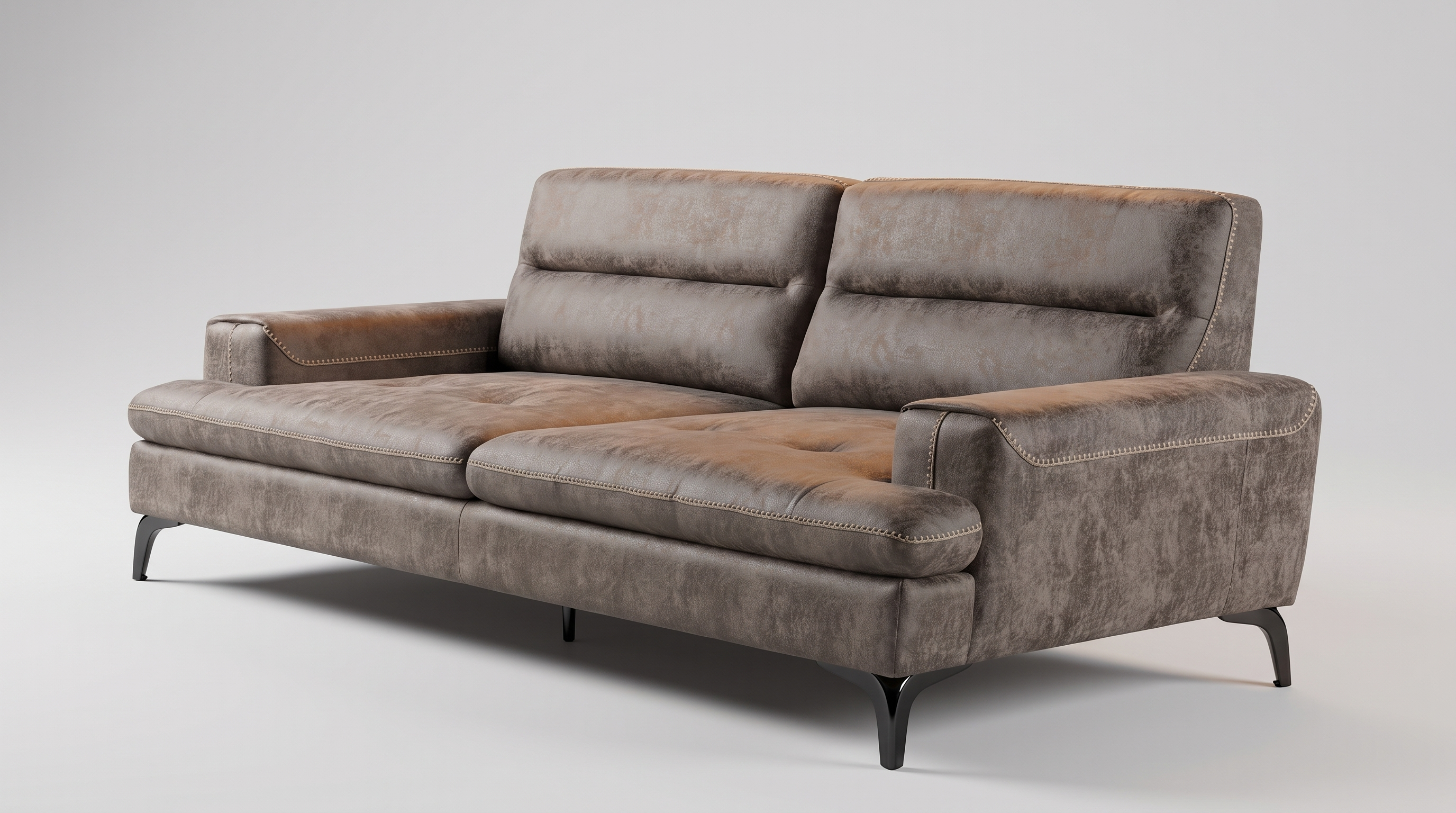 Sotta sofa, ceo komad malo ukoso: niske ravne ploče rukonaslona, naslon koji se diže iza njih i krupan bod po ivicama