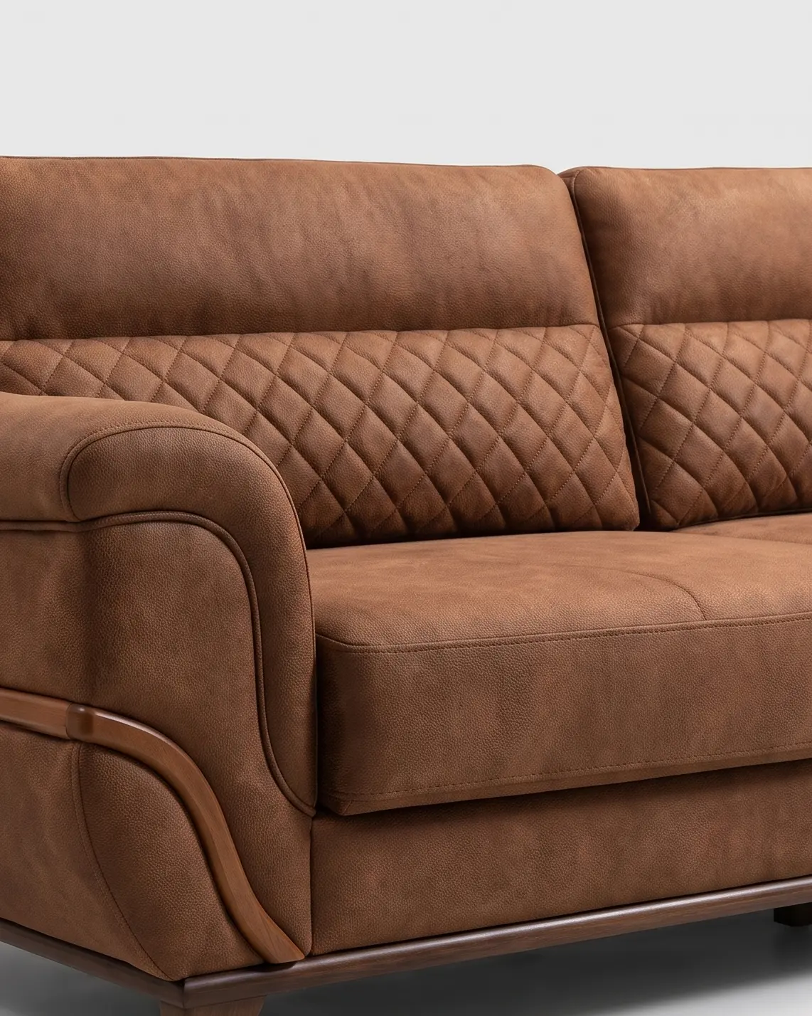 Aieta sofa, jastuci naslona: glatka gornja polja i donja prošivena u romb, iznad ravnog jastuka sedišta