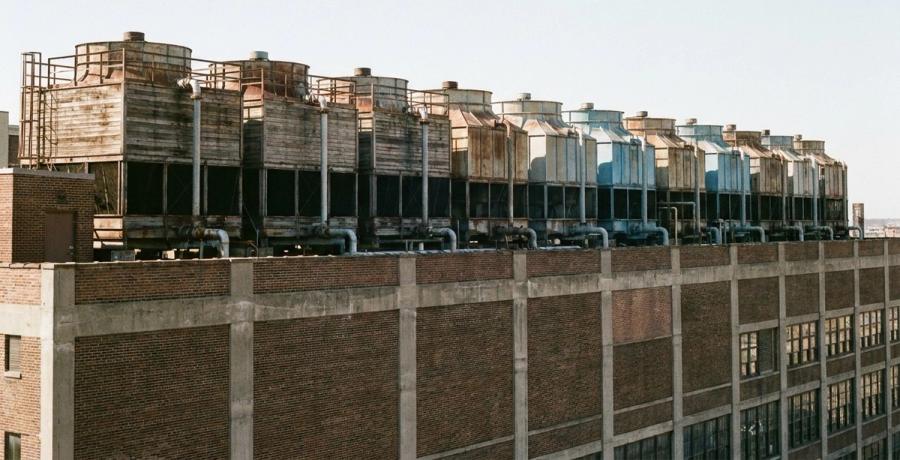 Rooftop cooling towers on a large commercial building.