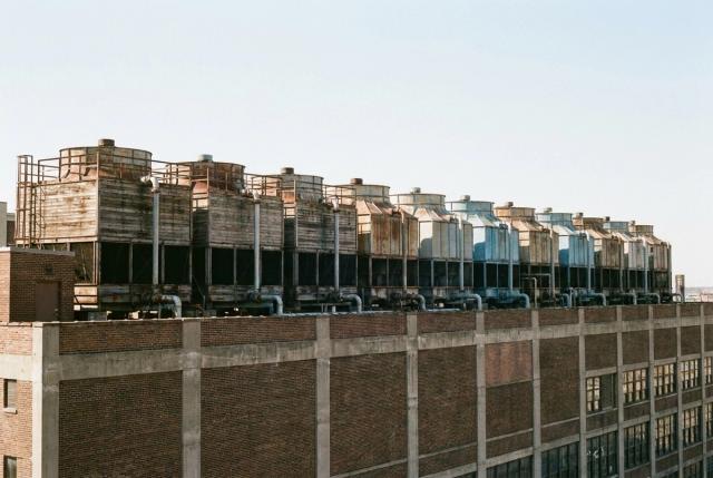 Rooftop cooling towers on a large commercial building.
