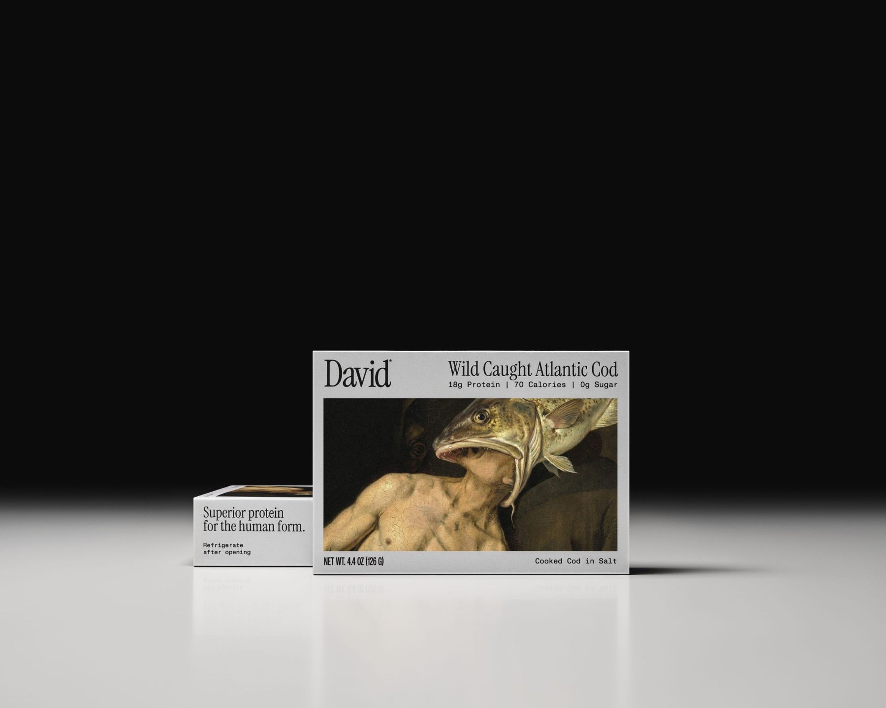 A box of David Wild Caught Atlantic Cod, its label a classical painting of a man being swallowed by a cod