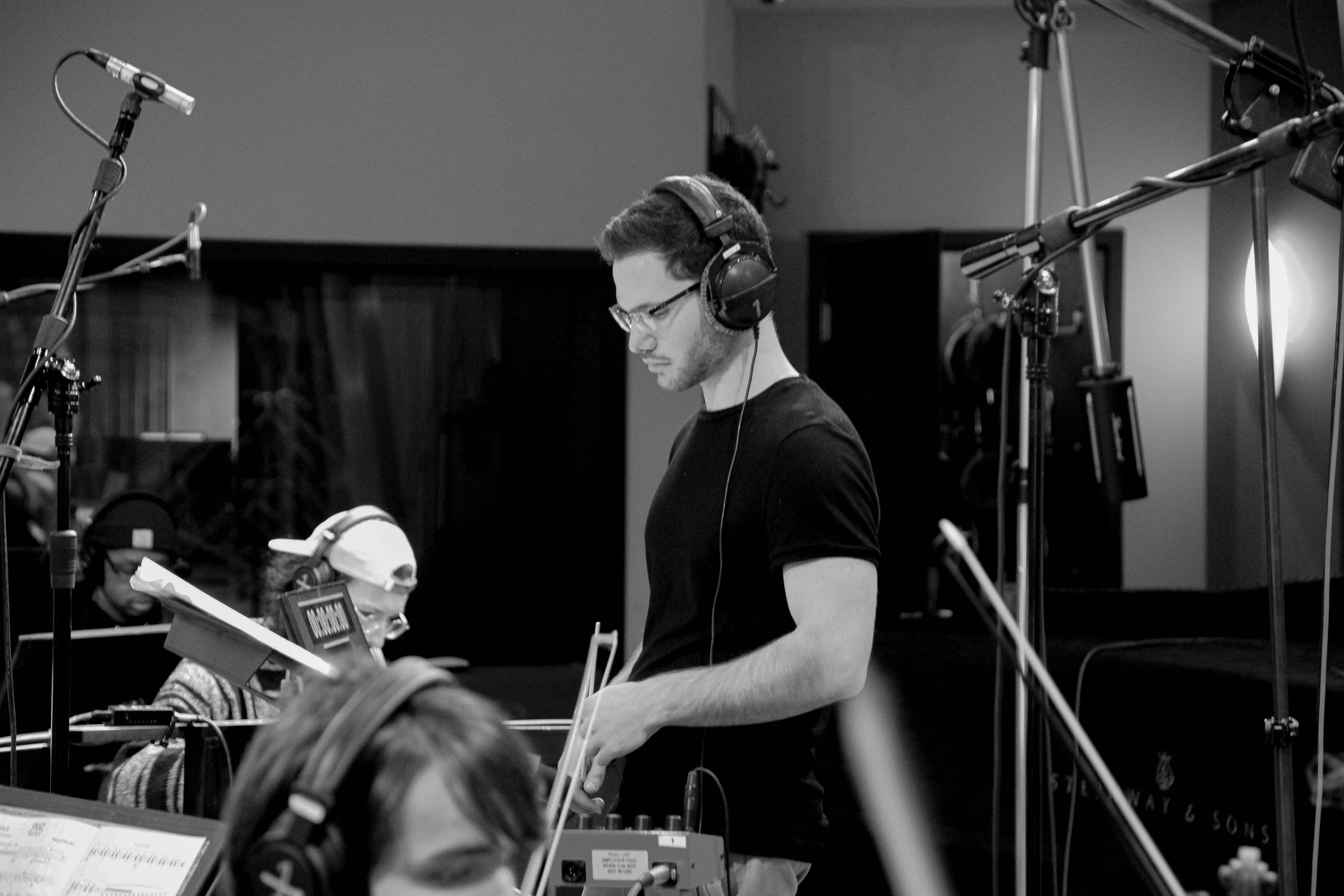 Composer Shaked Shachar conducting a scoring session at Berklee